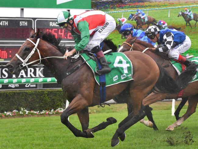 Jockey Robbie Fradd (left) rides See the Master to victory in race one, the Hollindale Stakes May 4 during the QTIS Jewel Raceday at Aquis Park on the Gold Coast, Saturday, March 16, 2019, AAP Image/Darren England.