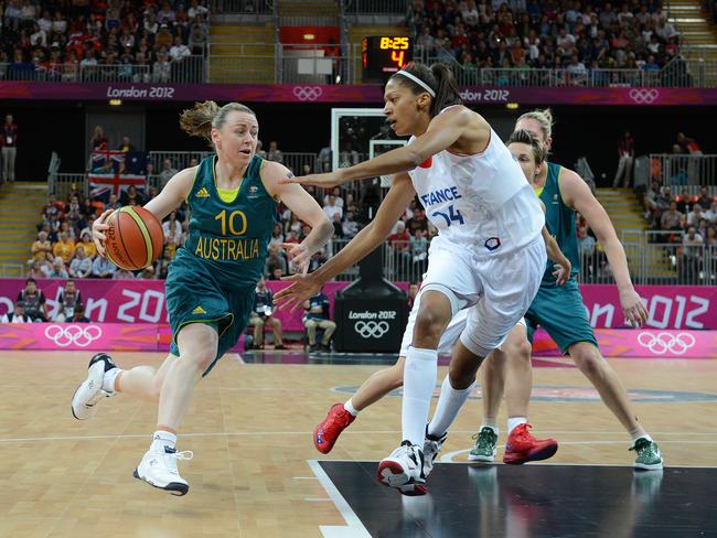 Australian basketballer Kristie Harrower (left) competes with Emmeline Ndongue of France during the Australia v France Womans Group B, Preliminary round basketball match at the Olympic Games in London, Monday, July 30, 2012. Picture: Dave Hunt