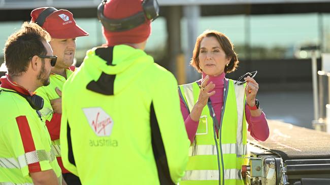 Virgin Australia chief executive Jayne Hrdlicka talking to ground staff airside at Brisbane Airport on Thursday. Picture: Lyndon Mechielsen