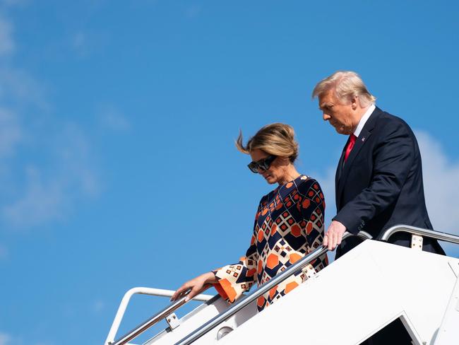 Former First Lady Melania Trump and ex-President Donald Trump step off Air Force One as they arrive at Palm Beach International Airport in West Palm Beach, Florida. Picture: AFP