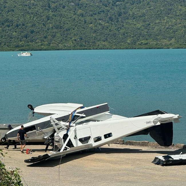 A sea plane that crashed into waters off Whitehaven Beach on October 26 has been moved to the mainland as further inquiries into the incident are made.