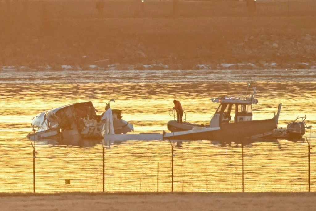 Part of the wreckage is seen as rescue boats search the waters of the Potomac River near Washington, on January 30, 2025