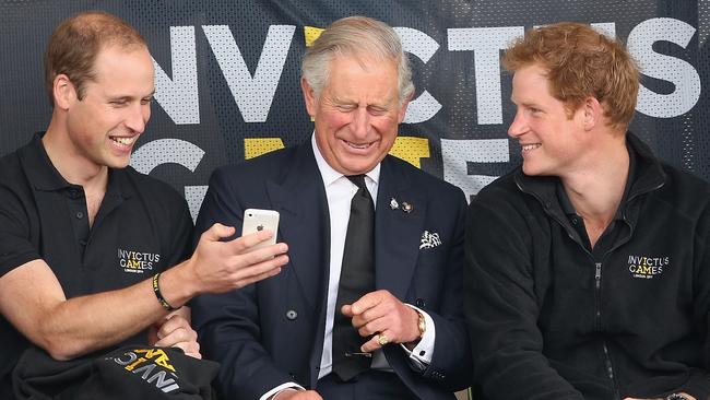 Prince William, Prince Harry and then Prince Charles in happier times. Picture: 2014.