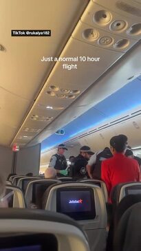 Unruly Jetstar passenger booted off flight