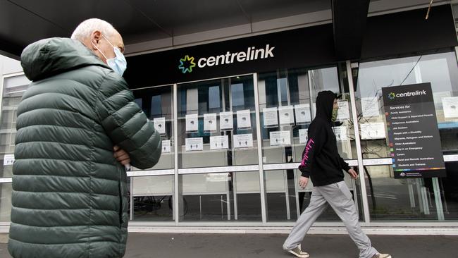 A man waits outside Centrelink in South Melbourne. Victoria was the only state or territory where unemployment increased. Picture: NCA NewsWire/David Geraghty