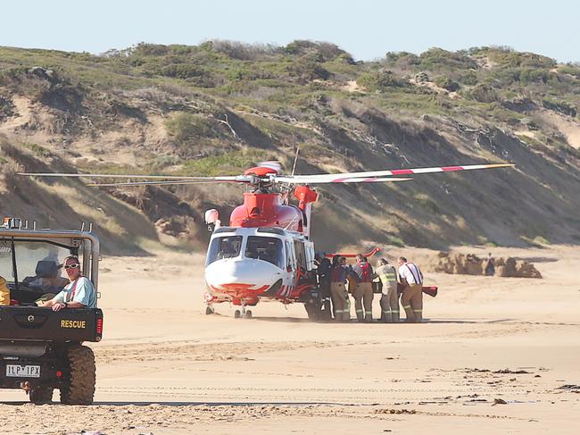 A casualty is carried to the air ambulance. Picture: Alan Barber