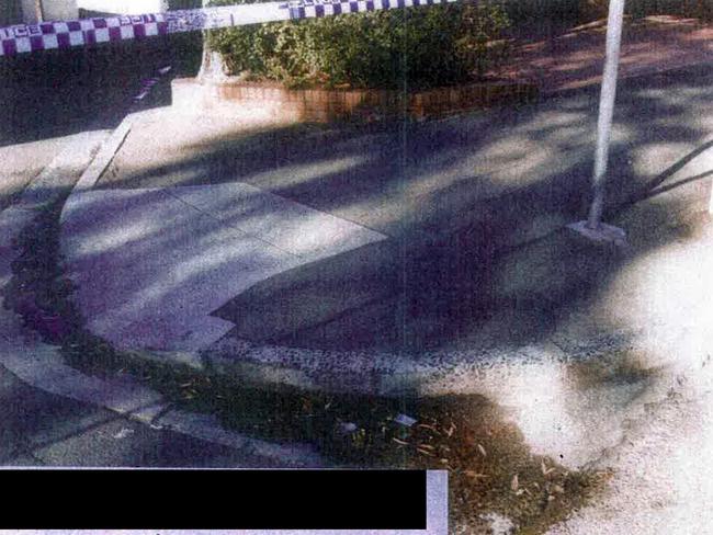 Rubbish is visible in the gutter on the corner of the Pacific Highway and Berry Lane.