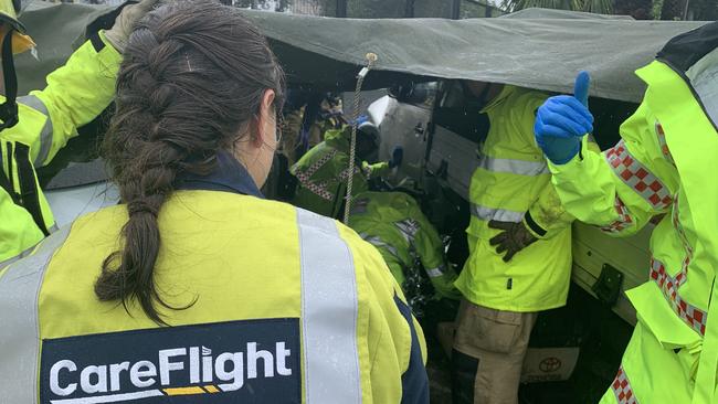 CareFlight’s Rapid Response Helicopter landed in Guildford Park after a woman became trapped under cars following a crash. Picture: CareFlight