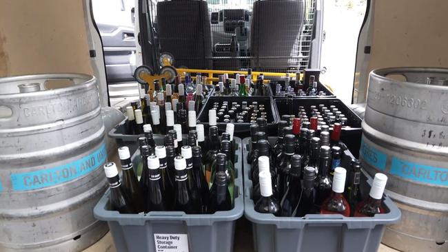 98 bottles of wine and two kegs were seized. .