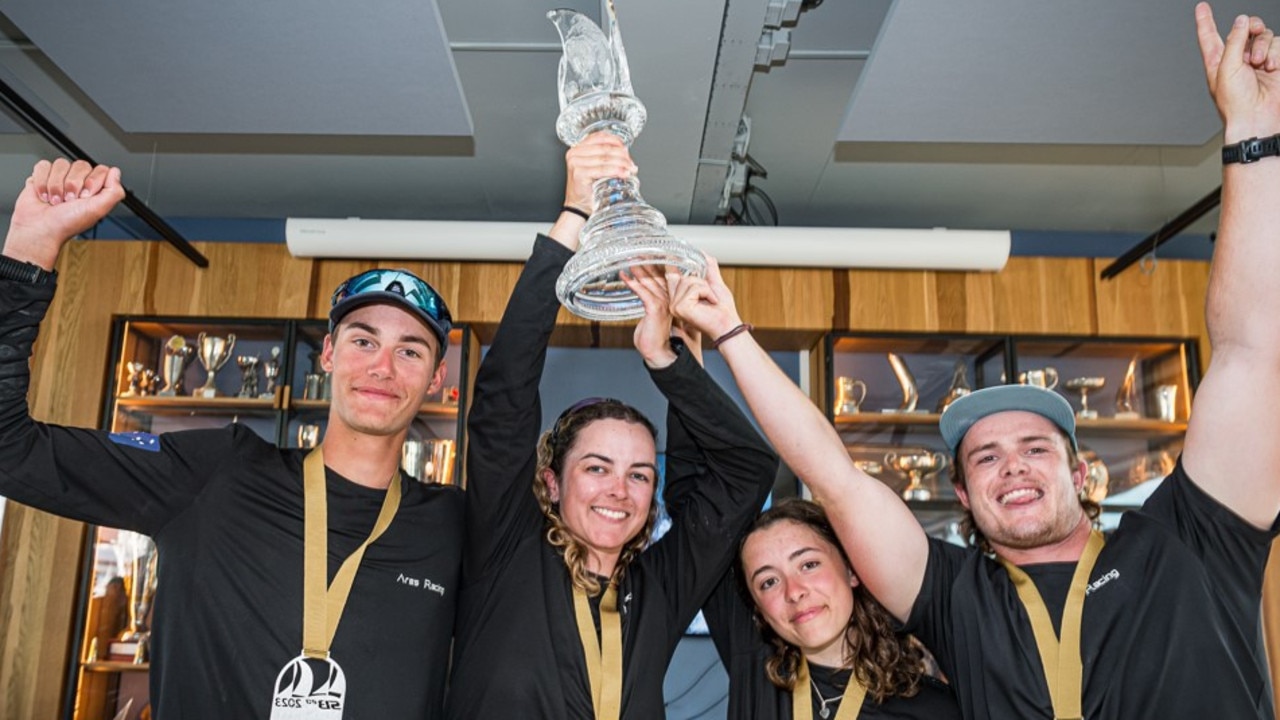 Hobartâ&#128;&#153;s Eddie Reid, Paige Caldecoat, of Newcastle, and Eirini Marios and skipper Will Sargent, also of Hobart, with their world championship prize. Picture Laurens Morel.jpg