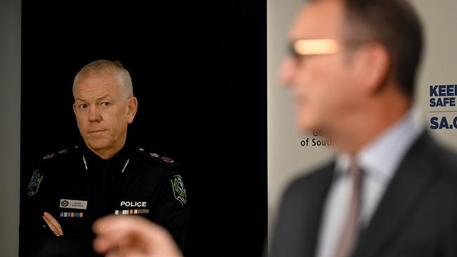 Police Commissioner Grant Stevens watches Premier Steven Marshall at a Covid-19 update in Victoria Square. Picture: NCA NewsWire / Naomi Jellicoe