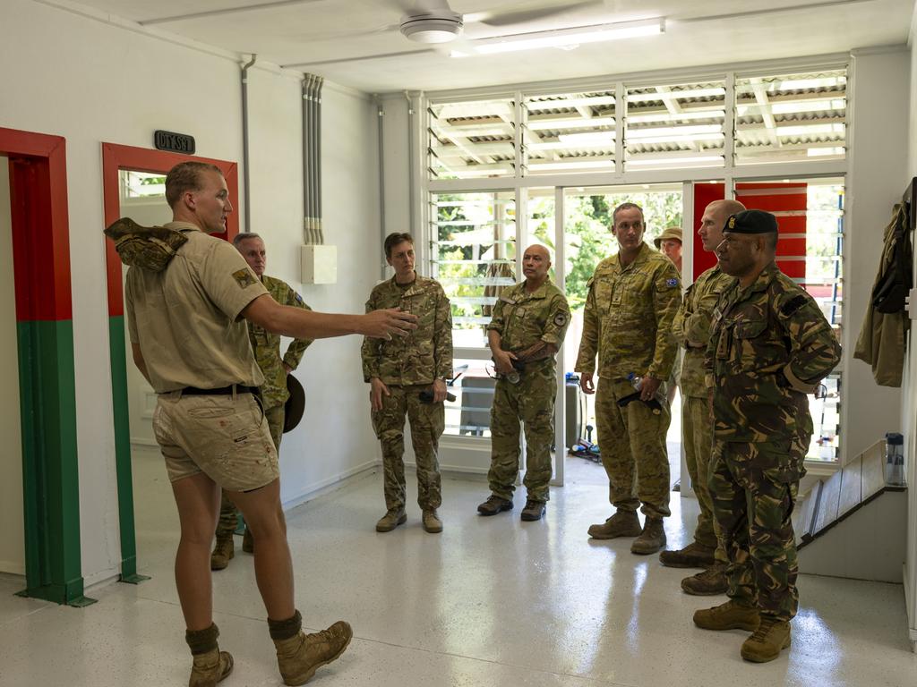 Australian Army soldiers from 3rd Combat Engineer Regiment refurbish facilities, such as the guard house as part of Exercise Puk Puk at Moem Barracks, Papua New Guinea. PHOTO: LCPL Riley Blennerhassett