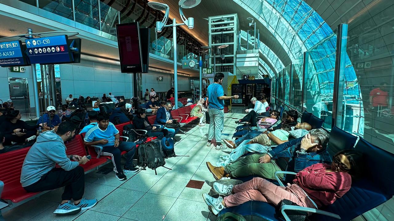 Passengers wait for their flights at the busy airport. Picture: AFP