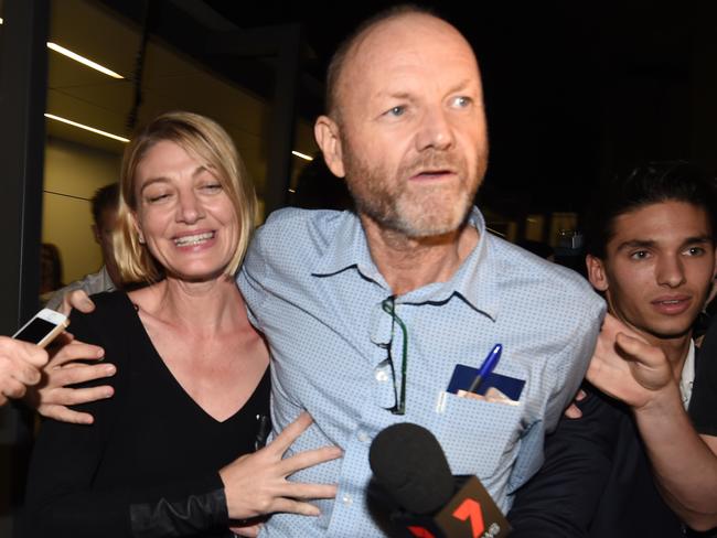 60 Minutes journalist Tara Brown and producer Stephen Rice arrive at Sydney International Airport on Thursday night. Picture: Sam Mooy