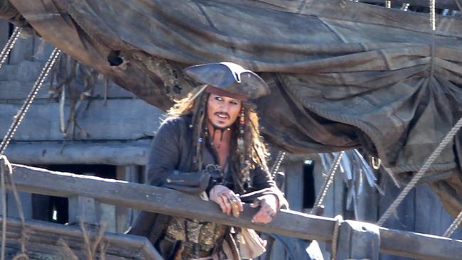 Johnny Depp on deck on The Dying Gull set at The Spit in 2015 during filming of Pirates of the Caribbean: Dead Men Tell No Tales. Picture: Tim Marsden