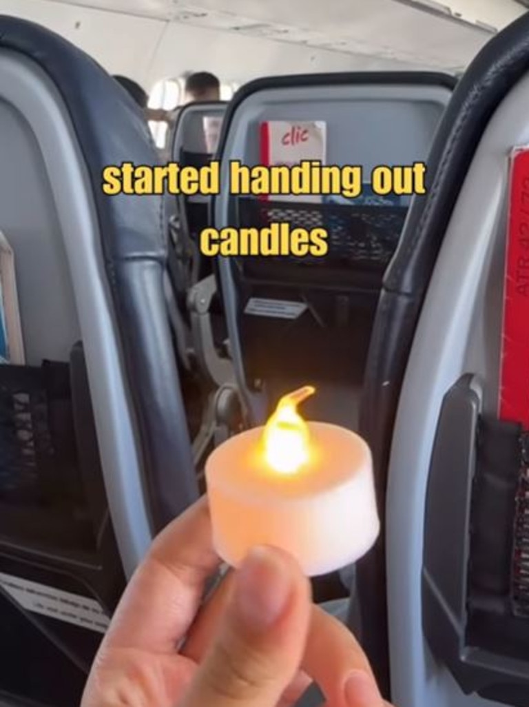 The attendants handed a candle to every passenger on the flight. Picture: Instagram@jula.vadini