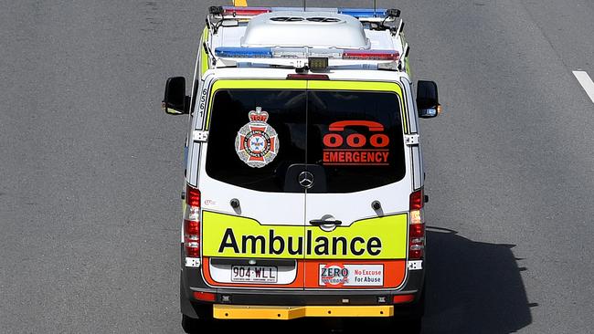 An Ambulance drives in a designated Commonwealth Games Lane on the Gold Coast, Wednesday, March 28, 2018.  Games Lanes will be activated over the weekend of 31 March for use by accredited vehicles travelling along the Games Route Network which links the Commonwealth Games Village at Parklands to key venues at Southport, Broadbeach and Carrara. (AAP Image/Dave Hunt) NO ARCHIVING