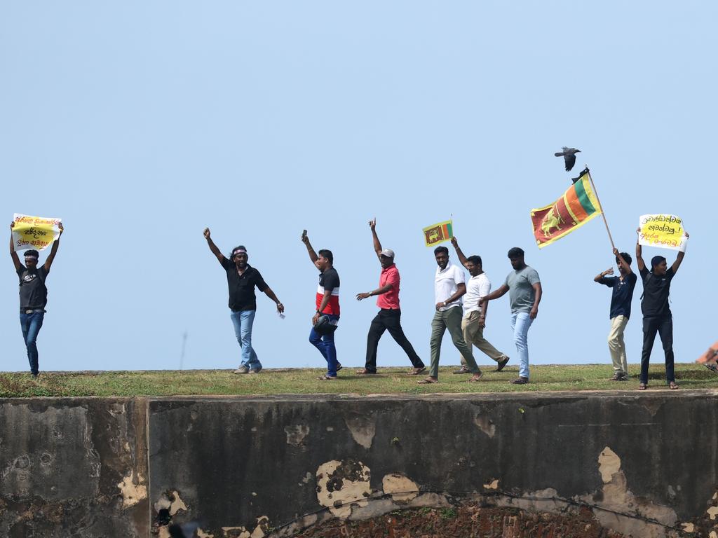 Anti-government demonstrators take part in protests on Saturday. Picture: Buddhika Weerasinghe/Getty Images
