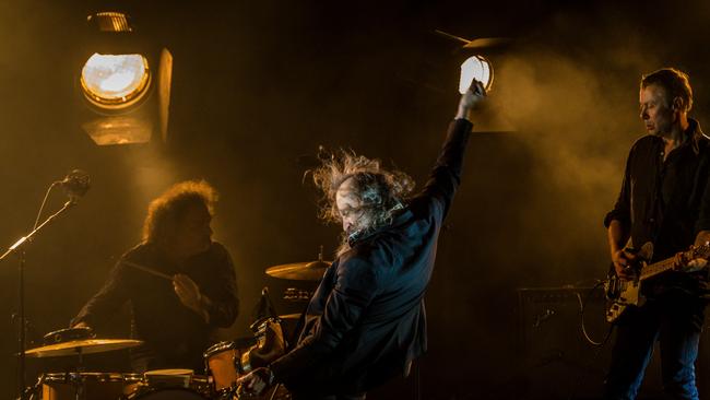 Warren Ellis performing with his Dirty Three bandmates Jim White (drums) and Mick Turner (guitar) at Dark Mofo festival, June 2019. Picture: Chris Crerar