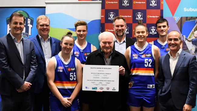 AFL Victoria’s Ricky Bell, Casey MP Tony Smith, Eastern Ranges players Mietta and Wil, Yarra Ranges Cr Len Cox and mayor Cr Tony Stevenson, Eastern Ranges players Serena and James, and Monbulk MP James Merlino celebrate the opening of the centre.