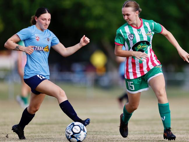 Townsville Warriors FC beat Estates FC 6-0 in round 3 of the Queensland Kappa Cup. Estates player Jaymee McCormack and Warriors player Emmaline Waters. Picture: Sharon Woodward.