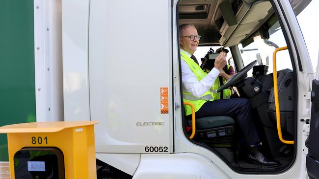 Prime Minister Anthony Albanese tests out one of the electric trucks at the official launch of the Team Global Express Battery Electric Vehicle fleet, which received a $20.1 million grant from ARENA. Picture: NCA NewsWire / Damian Shaw