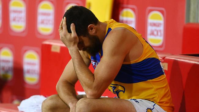 GOLD COAST, AUSTRALIA - SEPTEMBER 17: Josh J. Kennedy of the Eagles is seen on the bench after he sustained an injury during the round 18 AFL match between the North Melbourne Kangaroos and the West Coast Eagles at Metricon Stadium on September 17, 2020 in Gold Coast, Australia. (Photo by Quinn Rooney/Getty Images)