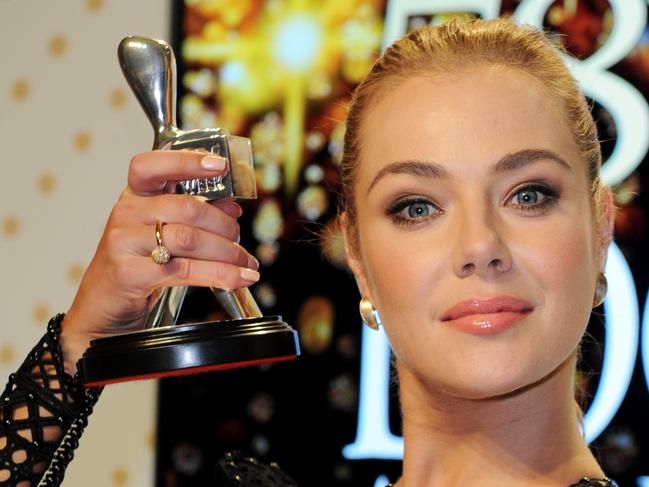 Best actor winner Jessica Marais with her award during the 2016 Logie Awards at the Crown Casino in Melbourne, Sunday, May 8, 2016. (AAP Image/Joe Castro) NO ARCHIVING
