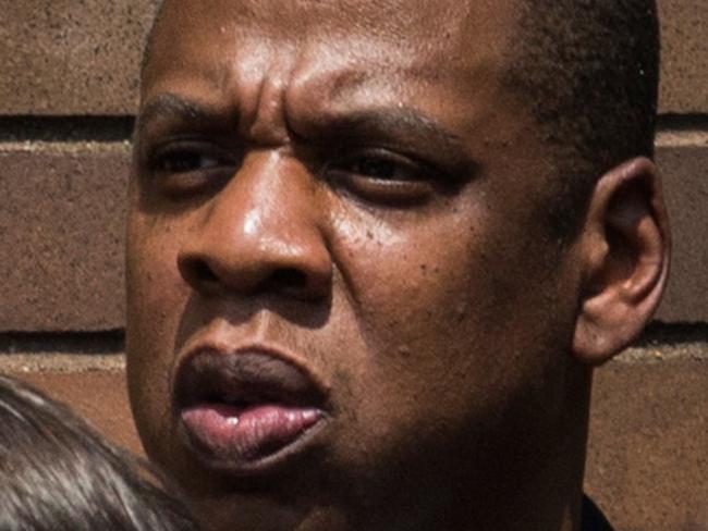 NEW YORK, NY - JULY 20: Musician Jay-Z attends a rally in support of Trayvon Martin, organized by the Reverend Al Sharpton, in response to the non-guilty verdict for George Zimmerman on July 20, 2013 in New York City. In February 2012, Zimmerman shot and killed Trayvon Martin, a teenager, in Sanford, FL; he was found not guilty of murder due to Stand-Your-Ground laws. Protests have continued across the country since Zimmerman was found not guilty on July 13, 2013. (Photo by Andrew Burton/Getty Images)