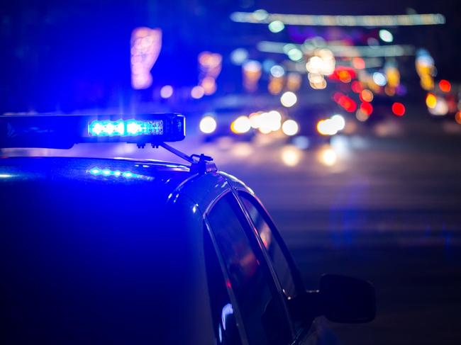 Police car lights at night. Photo: RACQ.