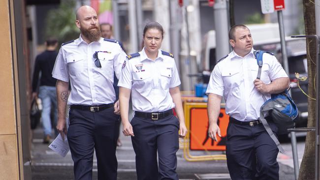 Paramedics Kingsley Newman (left) and Anna Hofner (centre) were called to Yallambee Lodge. Picture: NewsWire / Jeremy Piper