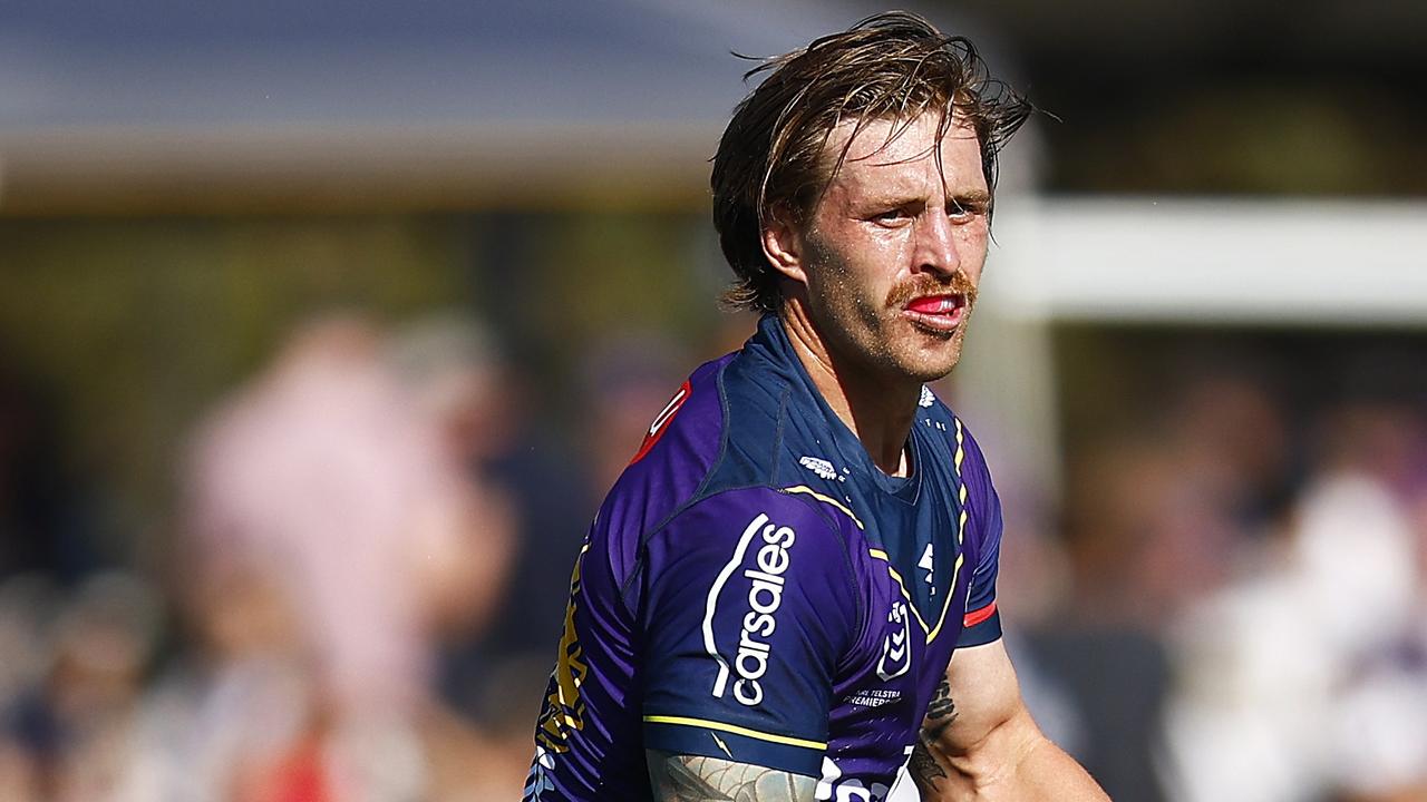MELBOURNE, AUSTRALIA - FEBRUARY 19: Cameron Munster of the Storm in action during the NRL Trial match between the Melbourne Storm and the New Zealand Warriors at Casey Fields on February 19, 2022 in Melbourne, Australia. (Photo by Daniel Pockett/Getty Images)
