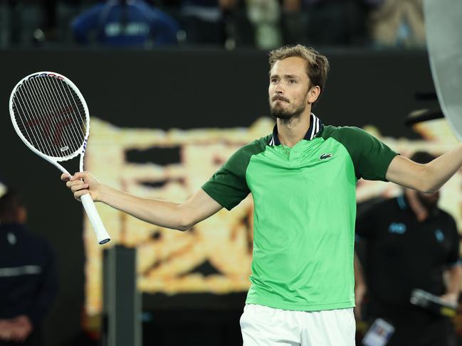 MELBOURNE, AUSTRALIA - JANUARY 26: Daniil Medvedev celebrates winning match point in their Semifinal singles match against Alexander Zverev of Germany during the 2024 Australian Open at Melbourne Park on January 26, 2024 in Melbourne, Australia. (Photo by Cameron Spencer/Getty Images)