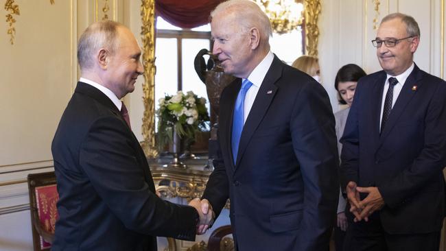 US President Joe Biden and Russian President Vladimir Putin shake hands in Geneva last week. Picture: Getty Images