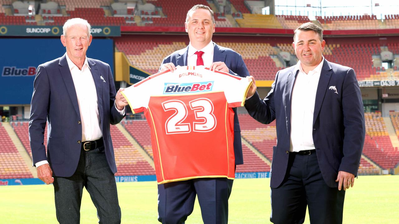 Dolphins coach Wayne Bennett, left, and CEO Terry Reader with Bill Richmond. Picture: Steve Pohlner