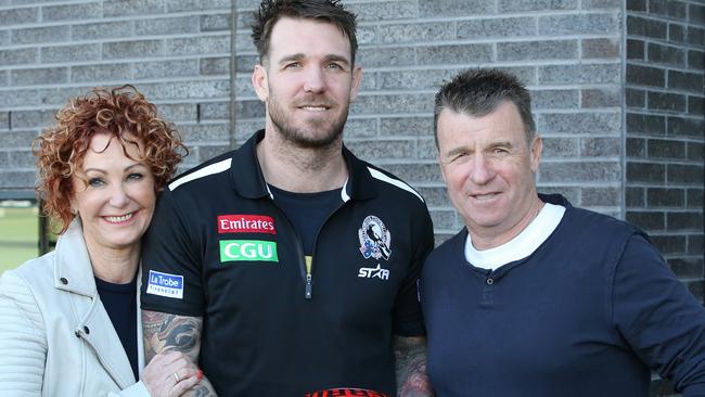 Dane Swan with his parents Deidre and Billy. Picture: Michael Klein