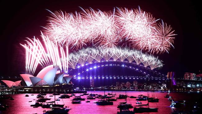 New Year’s Eve fireworks erupt over Sydney's iconic Harbour Bridge and Opera House. Picture: AFP