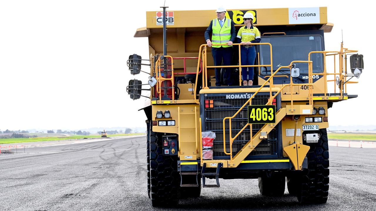 Prime Minister Scott Morrison gets a ride with Haul truck operator Julie Moore during his visit to the Western Sydney airport site. Picture: NCA NewsWire / Jeremy Piper