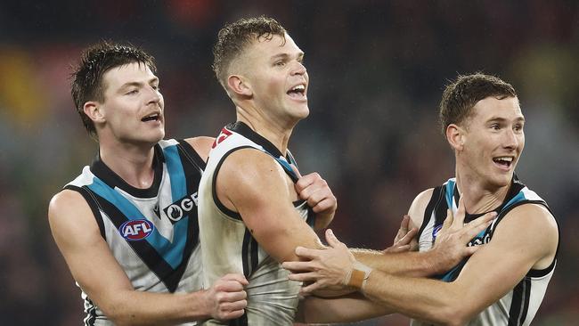 Dan Houston (centre) kicked the matchwinner after the siren. (Photo by Daniel Pockett/Getty Images)