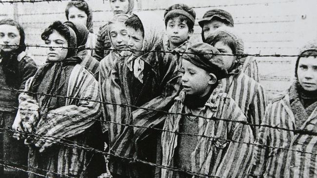                         <s1>Children liberated from the Auschwitz extermination camp in 1945.</s1>                     