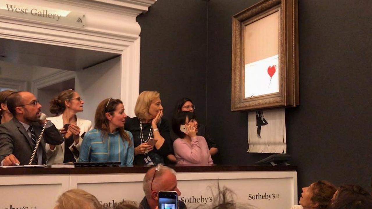 Banksy's Girl With Balloon (2006) mysteriously selfdestructed at the end of a Sotheby's auction. Picture: Instagram