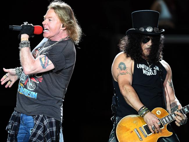 Lead singer Axl Rose (left) and guitarist Slash of hard rock band Guns N' Roses performs in Brisbane, Tuesday, Feb. 7, 2017. It is the band's first Australian concert of their Not In This Lifetime tour with additional shows in Sydney, Melbourne, Adelaide and Perth. (AAP Image/Dan Peled) NO ARCHIVING, EDITORIAL USE ONLY