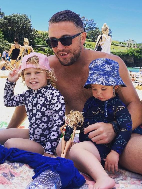 The former NRL star with his kids at Coogee beach.