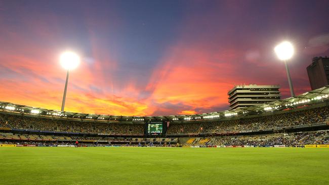 BRISBANE, AUSTRALIA - FEBRUARY 21: The sun sets behind the Gabba stadium during game eight of the One Day International Series between India and Sri Lanka at The Gabba on February 21, 2012 in Brisbane, Australia. (Photo by Bradley Kanaris/Getty Images)