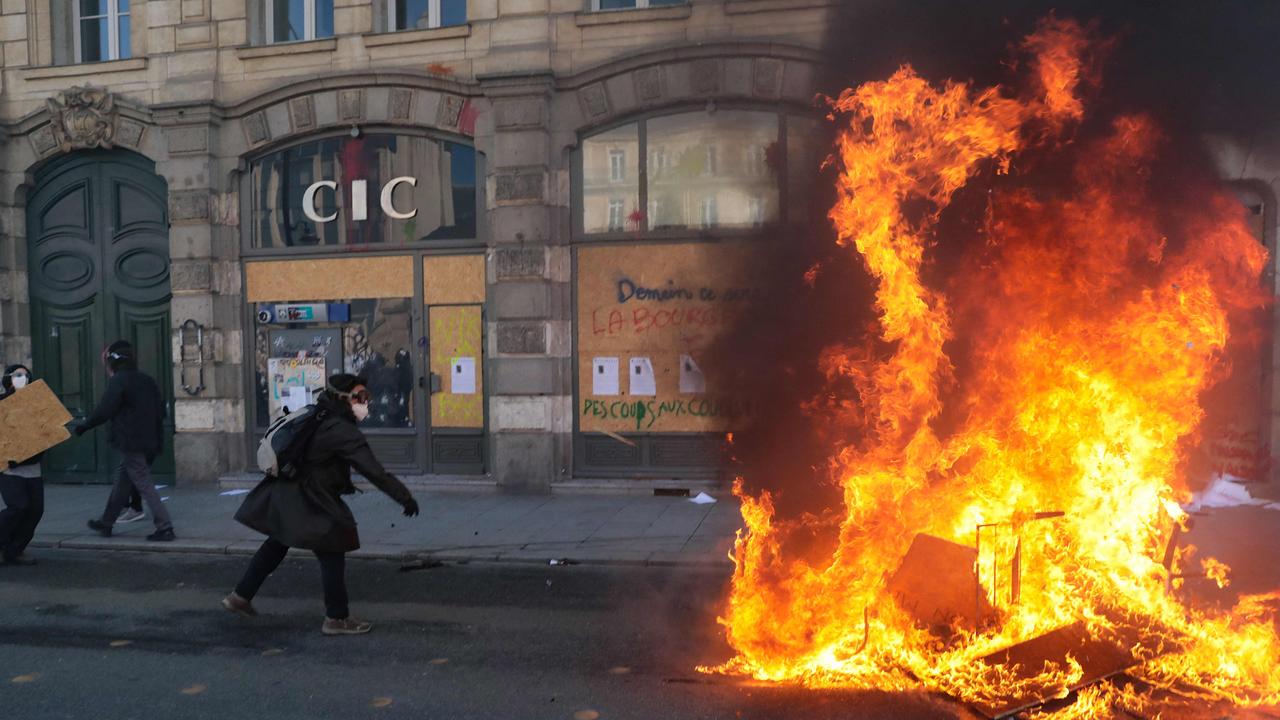 Protesters clash with police on Saturday. Picture: Lou Benoist/AFP