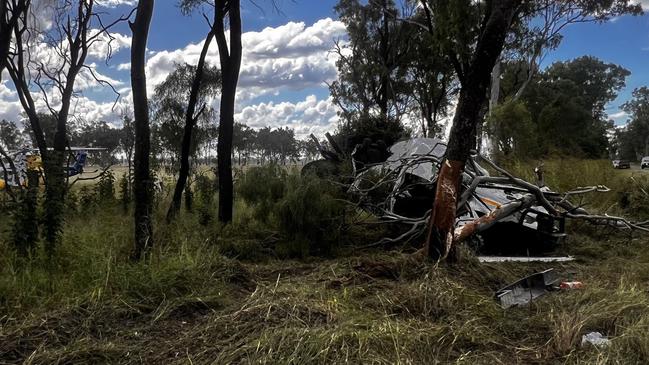 A man in his late 40s was taken to hospital after a car collided with a tree on South Ulam Rd at Bajool. Pics: RACQ CapRescue