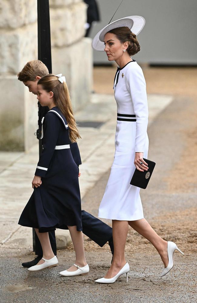 Princess Charlotte played a protective role on her mother’s big day, a body language expert says. Picture: AFP