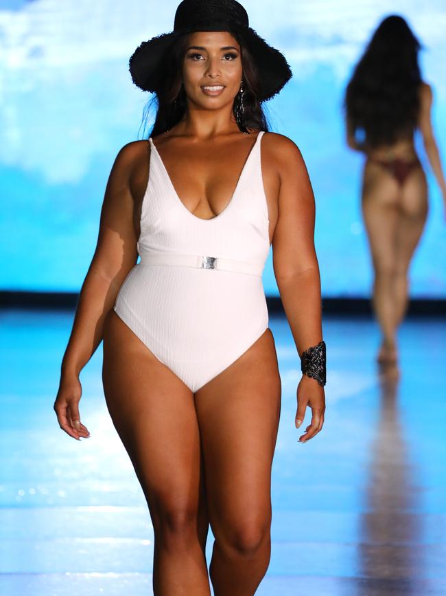 MIAMI BEACH, FLORIDA - JULY 10: A model walks the runway for Breezy Swimwear during DC Miami Swim Week: The Shows at SLS Hotel on July 10, 2021 in Miami Beach, Florida. (Photo by Thomas Concordia/Getty Images for DC Swim Week)