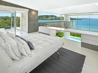 Solis, a property at 4 Plum Pudding Close on Hamilton Island, is for sale for $15 million. It features views of the Coral Sea and three swimming pools. Picture: JJ Pictures