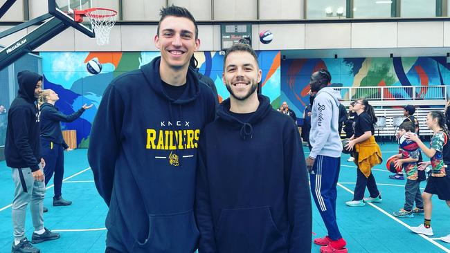 Basketballers Mason Peatling and Ben Ayre at the opening of the new Westfield Knox basketball court.